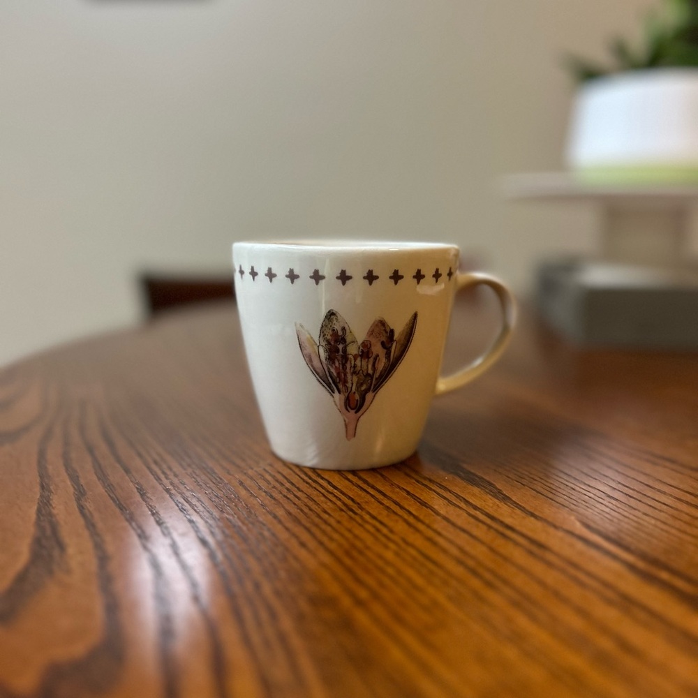 CREATIVE CO-OP | “Be Still” Ivory Cream Mug with Floral Design